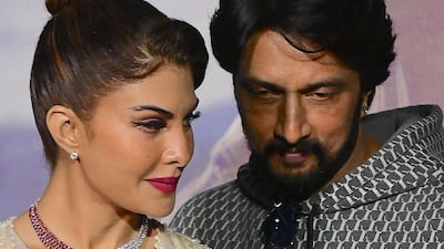 Fernandez and South Indian actor Kichcha Sudeep promote their Kannada film 'Vikrant Rona' in Mumbai. AFP