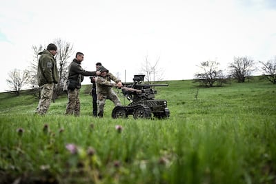 Soldiers training on robots in the Zaporizhzhia region. AFP