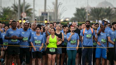 Runners line up at the start line.