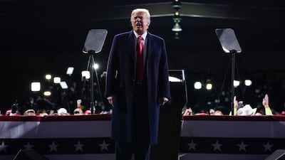 President Donald Trump speaks at a campaign rally for Senate Republican candidates, Sen. Kelly Loeffler, R-Ga., and Sen. David Perdue, R-Ga., at Valdosta Regional Airport, in Valdosta, Ga. AP Photo