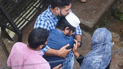 Rescue workers search for survivors in the rubble of a collapsed five-storey apartment building in Mahad, about 170 kilometres from India's financial capital of Mumbai. AFP