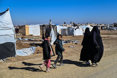 Detainees with links to ISIS pass through Al Hol camp in Hasakah, Syria in late January. Getty Images