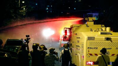 Israeli security forces spray Palestinian protesters with 'skunk water' in Sheikh Jarrah. AFP