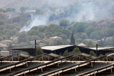 Smoke plumes rise from a fire in a field after a drone launched from southern Lebanon landed near Moshav Dishon in the Upper Galilee in Israel near the Lebanese border on June 23, 2024. AFP