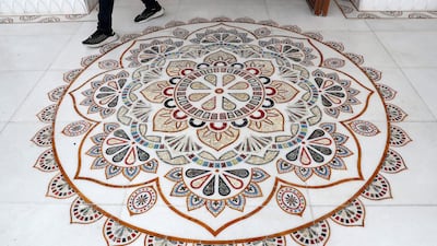 Striking marble designs adorn the entrance. Pawan Singh/The National.