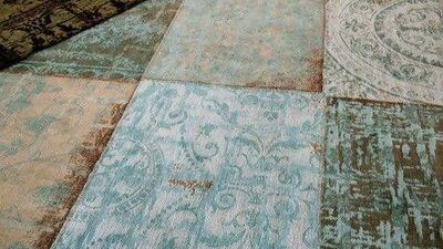 The stitched-together panels of Louis De Poortere's Multi rug put a contemporary twist on traditional oriental carpet and patchwork techniques.