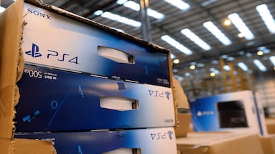 Boxes of PlayStation 4 stacked at the Fulfilment Centre for online retail giant Amazon in Peterborough, central England. The UAE is due to roll out the PS4 later this week but experts warn demand will outstrip supply, leaving gamers disappointed. Andrew Yates/AFP