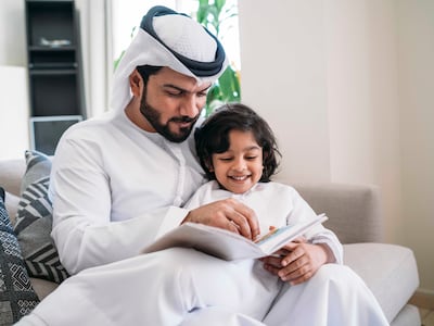 Minimalist parents favour reading books over screen time. Getty Images
