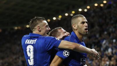 Leicester City’s Islam Slimani celebrates with Jamie Vardy after scoring their first goal. Carl Recine / Reuters