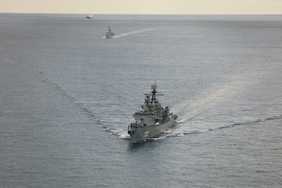 HMS Iron Duke, in the background, shadowing the Russian frigate Neustrashimy in the English Channel. Reuters