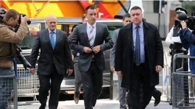John Terry, centre, arrives at Westminster Magistrates court for the final day on his hearing of racial abuse charges.