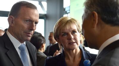 Australian foreign minister Julie Bishop, centre, told Indonesia on June 15 to better secure its borders in a stinging rebuke against Jakarta. Seen here with Australian prime minister Tony Abbott, left. Saeed Khan/AFP Photo