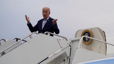 US President Joe Biden motions before boarding Air Force One in Albuquerque, New Mexico, on Saturday. AP Photo