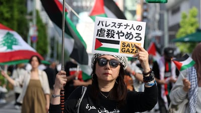 Pro-Palestinian activists protest through the streets of Ginza. Tokyo, Japan. Chris Whiteoak / The National