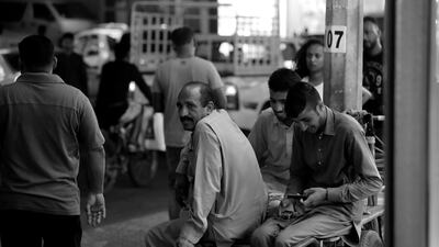 These photos, taken during the hottest time of year in dubai, show how life carries on along Dubai Creek. Chris Whiteoak / The National