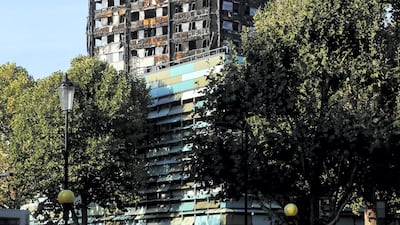 The burnt out remains of the Grenfell tower block in northwest London. REUTERS/Eddie Keogh - RC1A7ECD7060