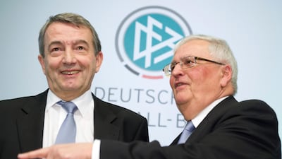 Former DFB president Theo Zwanziger (right), its general secretary Horst R. Schmidt and Swiss ex-FIFA general secretary Urs Linsi are accused of jointly committing fraud, while Wolfgang Niersbach (left) is charged with being complicit in fraud. Arne Dedert/dpa via AP