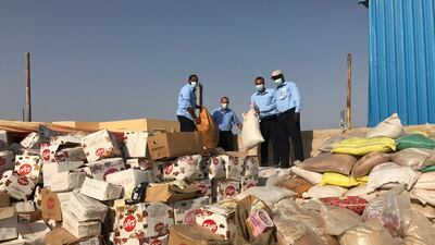 Fourteen tonnes of expired food and cosmetics were seized from a Sharjah warehouse on Monday. Sharjah Municipality
