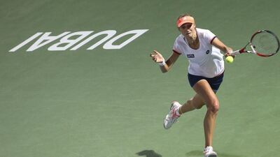 Ekaterina Makarova returns a shot during her loss to Serena Williams on Tuesday. Faisal Al Nasser / Reuters