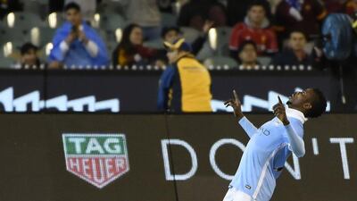 Manchester City's Kelechi Iheanacho celebrates his goal against AS Roma on Tuesday in his side's tour victory in Australia. Mal Fairclough / AFP