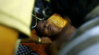 A Tibetan monk in exile participating in a hunger strike is checked by the doctor on the ninth day of the hunger strike in New Delhi. Hours later, police officers descended on the protesters, bringing the nine-day stand-off to a decisive end.