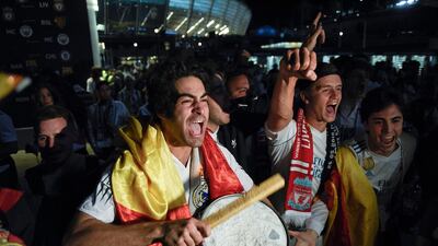 Real Madrid supporters celebrate in Kiev, Ukraine. Andrew Kravchenko / AP Photo