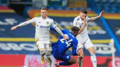 Chelsea's Reece James, centre, challenges for the ball with Leeds United's Ezgjan Alioski, left and Mateusz Klich at the Elland Road Stadium. AP