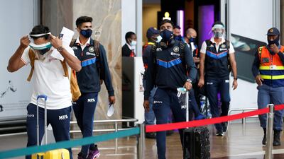 Shreyas Iyer and Mohammed Siraj with the India team at the OR Tambo International Airport in Johannesburg for their tour of South Africa. AFP