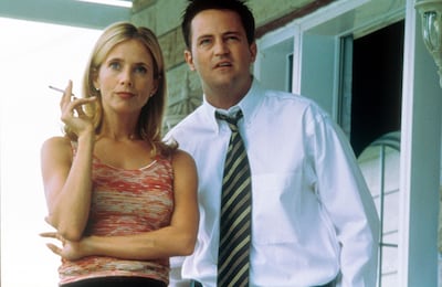 Rosanna Arquette and Matthew Perry in The Whole Nine Yards. Alamy