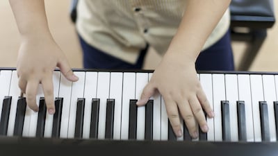 More astounding than his relatively small practise schedule – typically fewer than two hours a day – is the fact Zhang has been playing for little more than four years. Reem Mohammed / The National