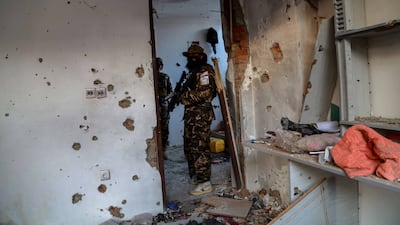 Taliban fighters inspect an ISIS hideout in Kabul. The UN says the terrorist group is a major threat in Afghanistan. EPA