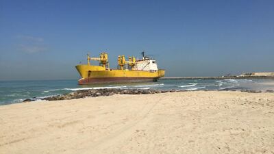 A ship that ran aground on Al Hamriya beach on Saturday. Thaer Zriqat / The National