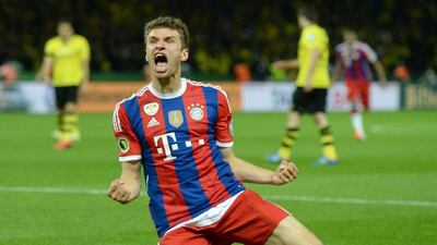 Bayern Munich midfielder Thomas Muller celebrates scoring the second goal during extra time of the German Cup final on Saturday as Bayern went on to win 2-0. Christof Stache / AFP / May 17, 2014