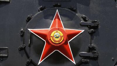 The Soviet Union coat of arms is seen on a star of a steam locomotive at the Museum of Railway Technology in Moscow. Sergei Karpukhin / Reuters