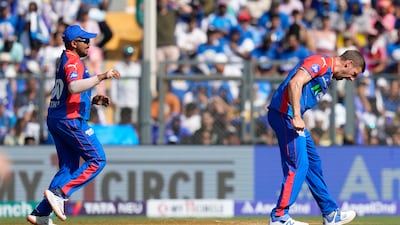 Delhi Capitals' Anrich Nortje, right, celebrates the dismissal of Mumbai Indians' Suryakumar Yadav. AP