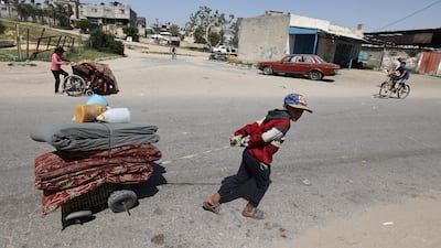 Palestinians flee Rafah towards Khan Younis in Gaza, after an Israeli eviction order. AFP