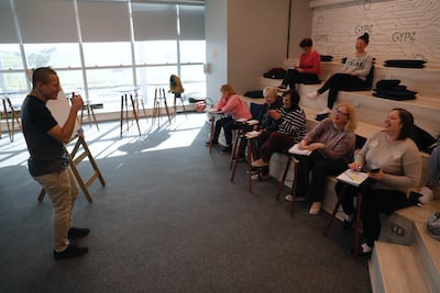 Ukrainian refugees, recently arrived in Brazil, receive Portuguese classes in May 2022. Effective multilingual education goes beyond grammar and vocabulary - it incorporates real-world contexts. EPA