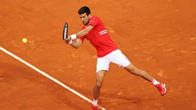 Novak Djokovic hits a backhand. Getty