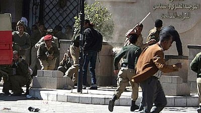 Supporters of Yemen’s president and protesters from the defence ministry clash in Sanaa.