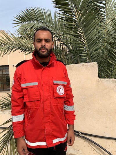 Hani Abou Khossa says he is determined to stay in Khan Younis and support rescue missions. Moaiad El Qirm for The National