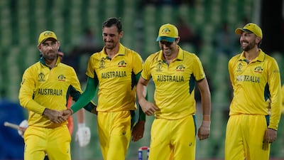 Australia's Mitchell Starc, second left, with teammates in Thiruvananthapuram. AP
