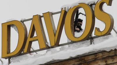A Swiss special-police officer stands on the roof of the Kongress Hotel next to the Congress Centre, on January 19, 2016, in preparation for the 46th World Economic Forum in Davos, Switzerland, which runs from January 20 to 23. The theme this year is Mastering the Fourth Industrial Revolution. Jean-Christophe Bott / EPA