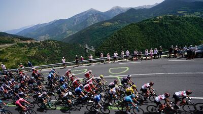 The peloton climbs towards Col de Puymorens pass during Stage 15.