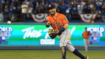 Houston Astros' second baseman Jose Altuve throws to first base in the ninth inning for the final out against the Los Angeles Dodgers in Game 7 at Dodger Stadium. Jayne Kamin-Oncea / Reuters