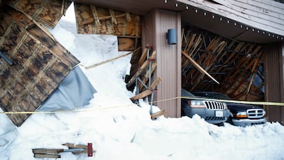 Collapsed roof of a garage. EPA
