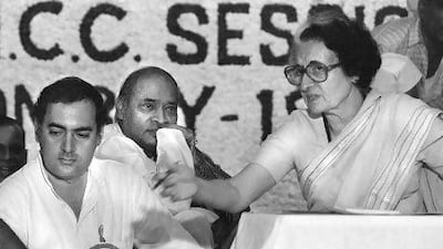 Indian prime minister Indira Gandhi (right) and her son Rajiv (left) at a Congress Party meeting in New Delhi in early 1984.