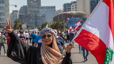 Anti-government protestors during a mass protest against the economic and financial crisis, and to demand early parliamentary elections, in Beirut, Lebanon. EPA