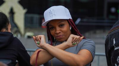 A fan pays tribute outside a memorial to celebrate the life of musician and actor DMX outside the Barclays Centre in Brooklyn, New York City. Reuters