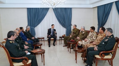 Syrian President Bashar Al Assad (C) meeting with a joint Iraqi-Iranian military delegations in Damascus, Syria, 18 March 2019. EPA