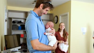 Matthew and Lenka Dalby with their new baby Elizabeth. Fatima Al Marzooqi / The National